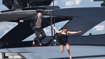See Kourtney Kardashian and Travis Barker's Dramatic Leap From a Yacht After Their Italian Wedding